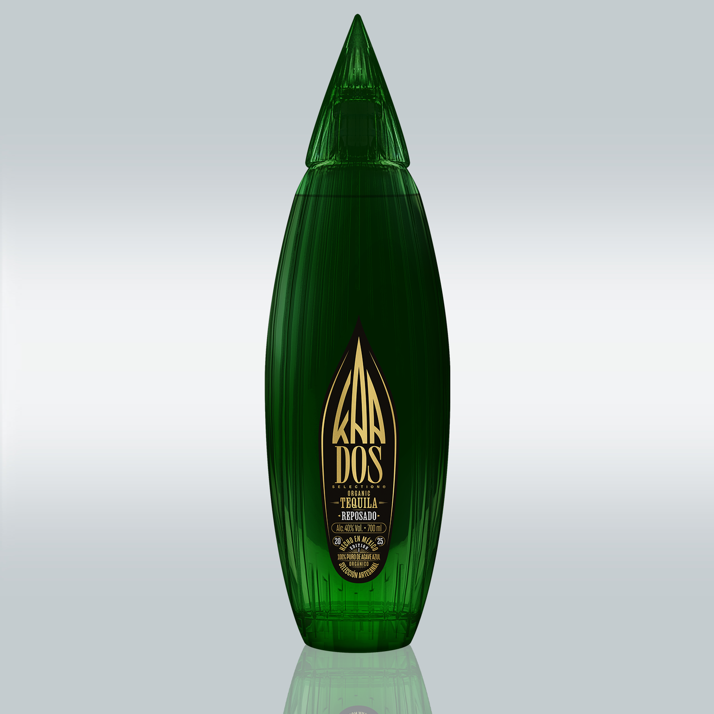 Front view of the KA DOS Reposado bottle in deep green glass with an agave-leaf shape. Features gold KA DOS logo on black label with text: “Organic Tequila Reposado”, 40% vol., and “100% Puro de Agave Azul”.