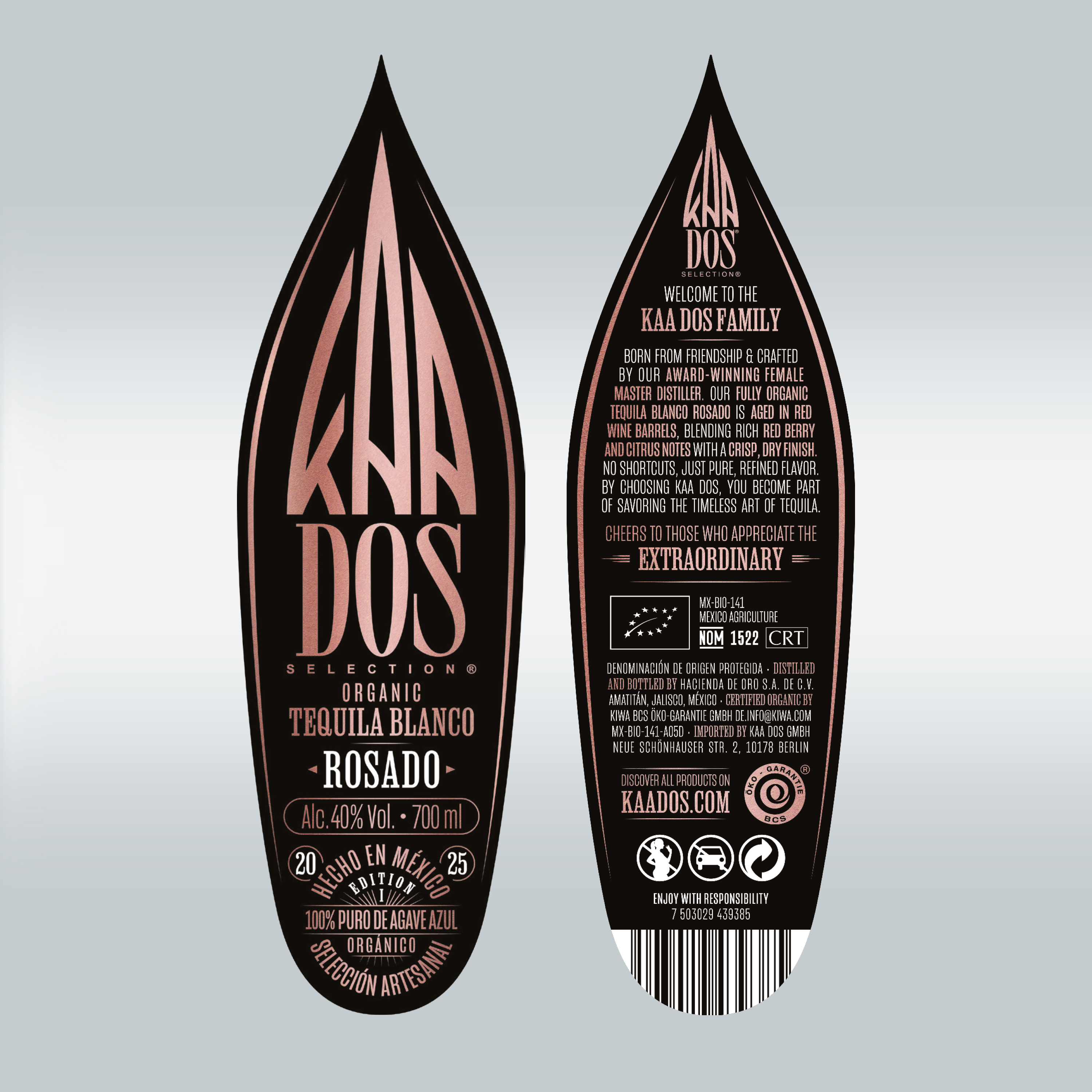 Close-up of KA DOS Rosado bottle labels, front and back, shaped like agave leaves. Front shows logo in rose-gold on black, with text: “Organic Tequila Blanco – Rosado”, 40% vol., and “100% Puro de Agave Azul”. Back highlights female master distiller, red wine barrel aging, and berry-citrus flavor. Includes CRT and NOM 1522 info, barcode, and icons.